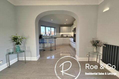 Lounge area into the kitchen