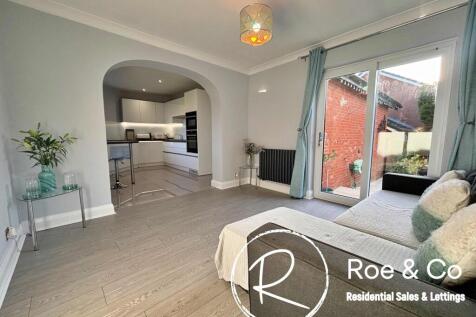 Lounge area into the kitchen