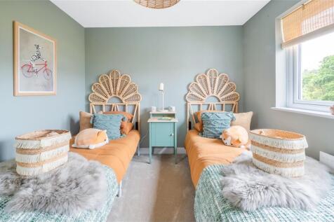 Bedroom 4 has space for two single beds or a double bed