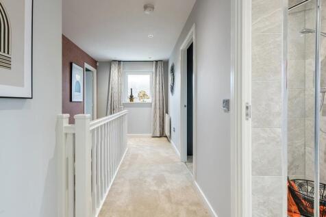 The landing is flooded with natural light