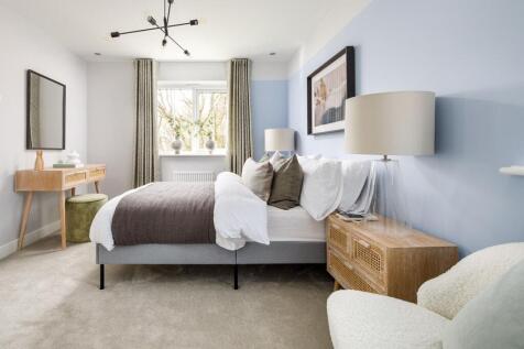 Bedroom 1 is flooded with natural light