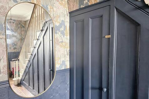 Under Stairs Entrance to Lower Floor