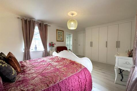 Bedroom One With Fitted Wardrobes 207