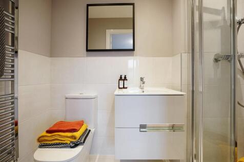 The main bedroom also benefits from it's own en suite shower room