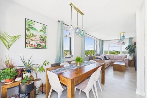 Dining area leading to living room