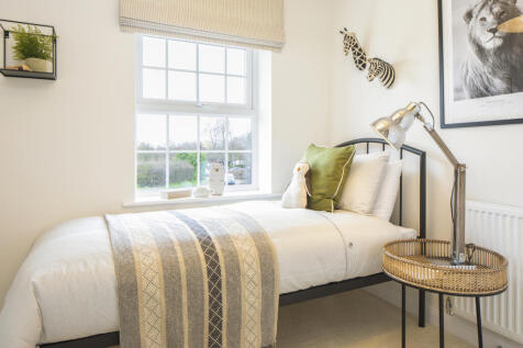 Bedroom in the Cornell 4 bedroom home