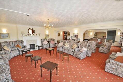 PHOTOS SHOW A GENERAL VIEW OF THE RET...