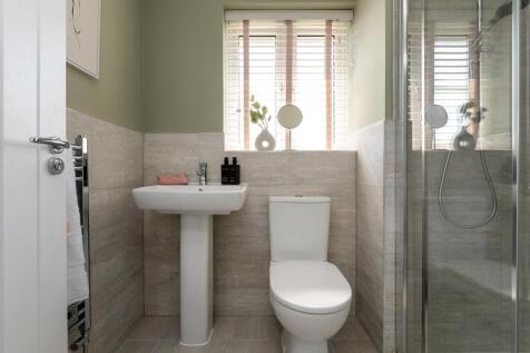 The main bedroom boasts an energy-efficient shower room