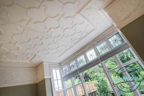 Ornate original ceiling to formal sitting room in 