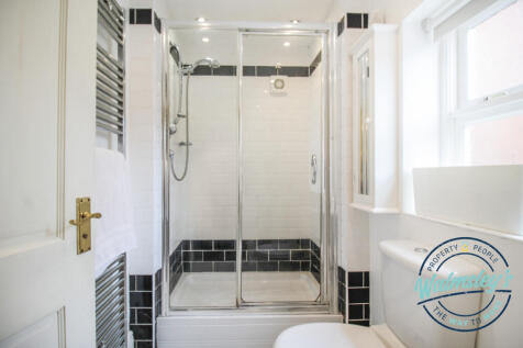 Shower room to right wing