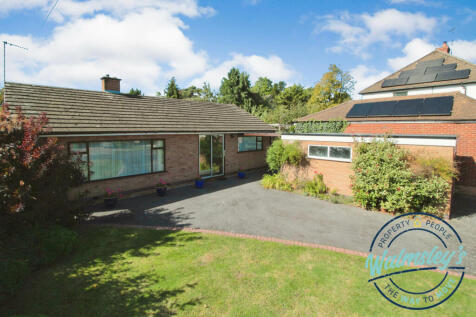 Elevated front &amp; driveway