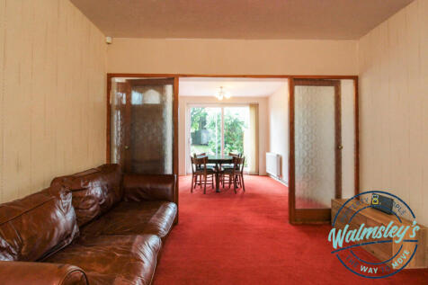 Sitting room through to dining