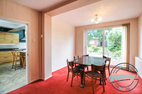 Dining room with door to kitchen
