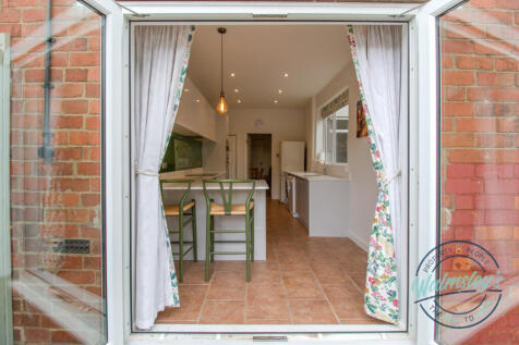 French doors from garden to kitchen breakfast room