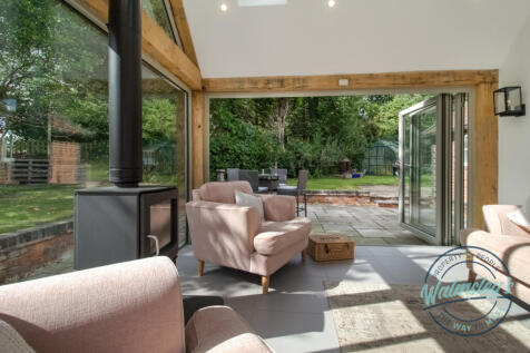Garden room with bi folding doors open