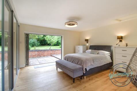 Main bedroom with bi-folding doors