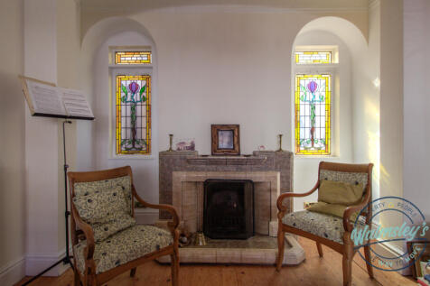 Stunning fireplace and Stained glass side panels