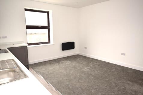 open plan lounge and kitchen