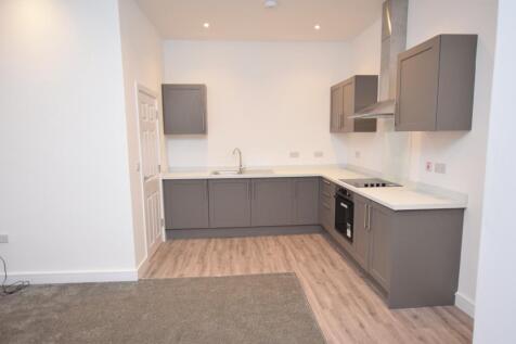 open plan lounge and kitchen