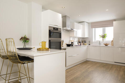 Open plan kitchen with family area in the 4 bedroom Grange