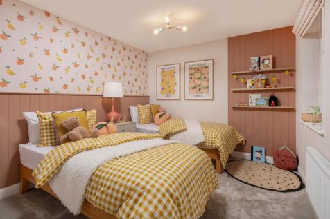 Holden bedroom with two single beds and fruit decor