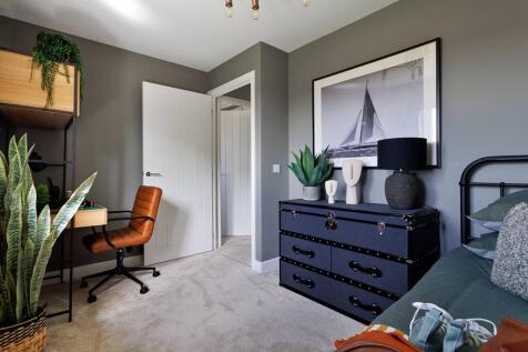 The third bedroom has space for another double bed or two single beds