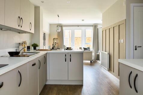 Downstairs is flooded with light from the french doors leading to the garden