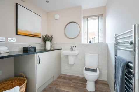 A downstairs toilet &amp; utility room adds convenience