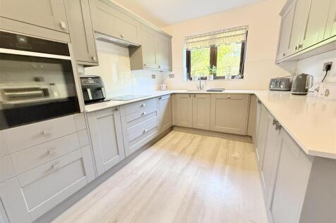 Fitted Kitchen With Utility Area