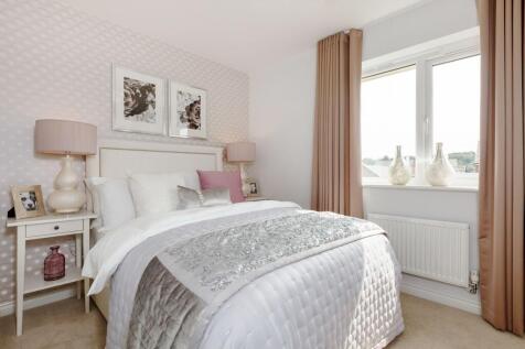 Bedroom one is welcoming and spacious