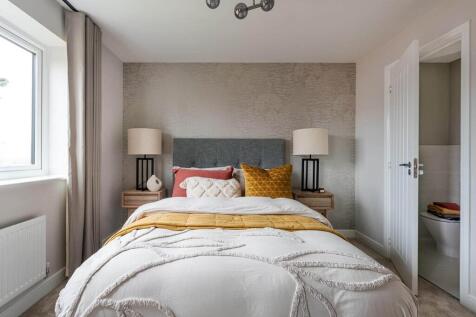 Relax away from the rest of the home in the spacious main bedroom