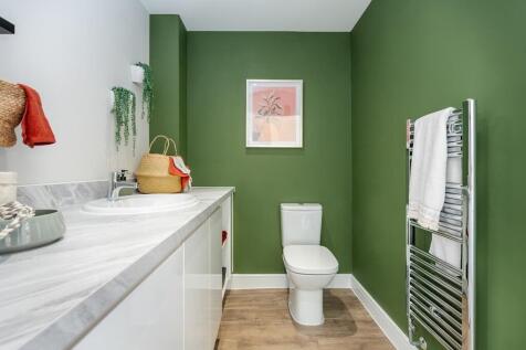 The guest cloakroom has space for laundry appliances