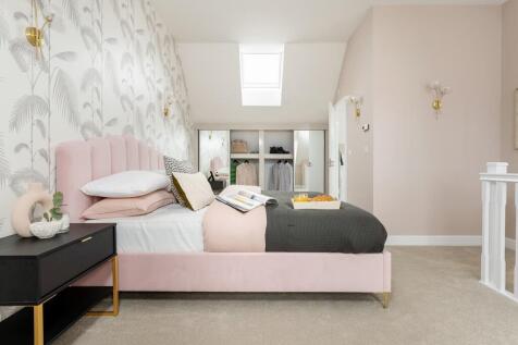 The main bedroom offers an a dressing area and private en suite shower area