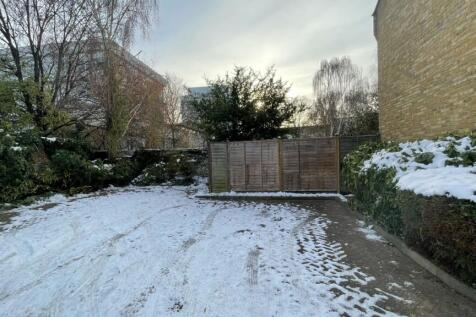 A spacious garden area, beautifully set against...