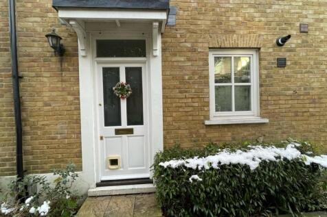 A charming entrance showcasing a well-maintaine...