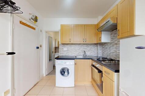 Bright and functional kitchen featuring wooden ...