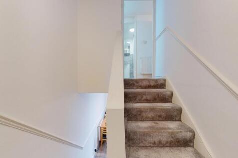 Bright, recently refreshed stairwell with new n...
