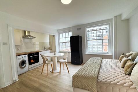 Bright, modern studio with an open-plan kitchen...