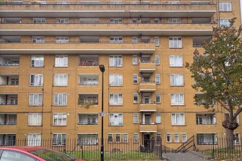 Brick-faced mid-rise apartment block with balco...