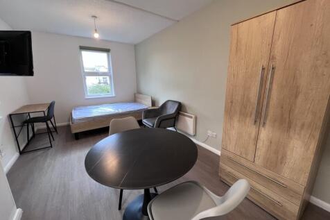 A spacious and bright double bedroom, perfect f...