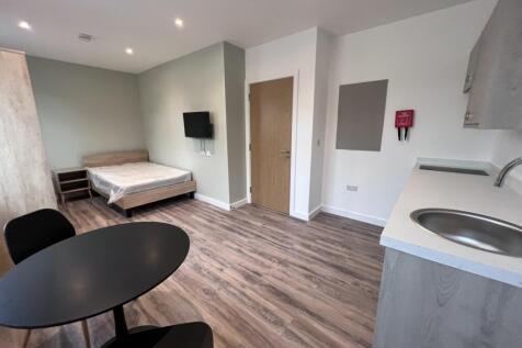 A modern and spacious double bedroom with ample...