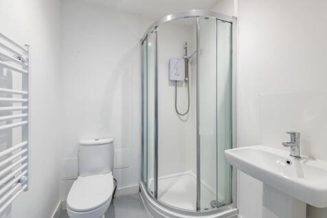A modern and clean bathroom featuring a stylish...
