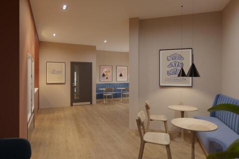 A bright and inviting communal lounge area perf...