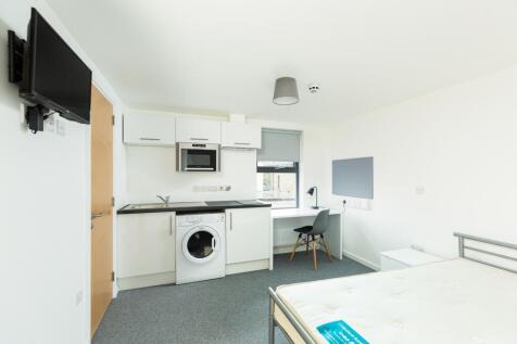 A bright and spacious double bedroom featuring ...