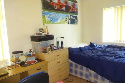 A bright and inviting double bedroom featuring ...