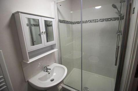 Experience a modern bathroom featuring a stylis...