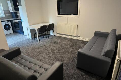 A stylish and inviting living room featuring co...