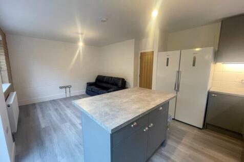 This inviting living area features ample space ...
