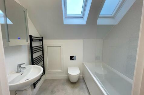 A beautifully designed bathroom suite featuring...