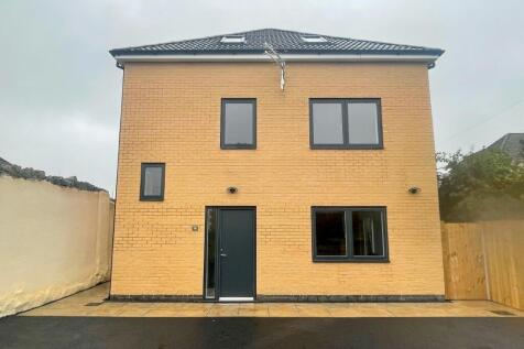 A modern and inviting front view of the propert...